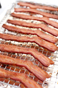 An easy step-by-step guide on how to cook bacon in the oven