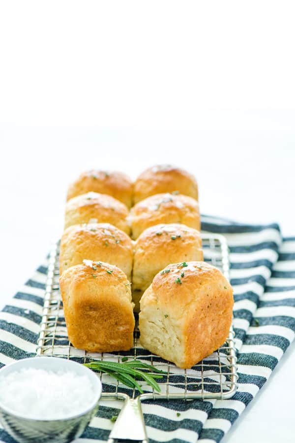 Soft gluten free rosemary rolls are flavored with fresh rosemary